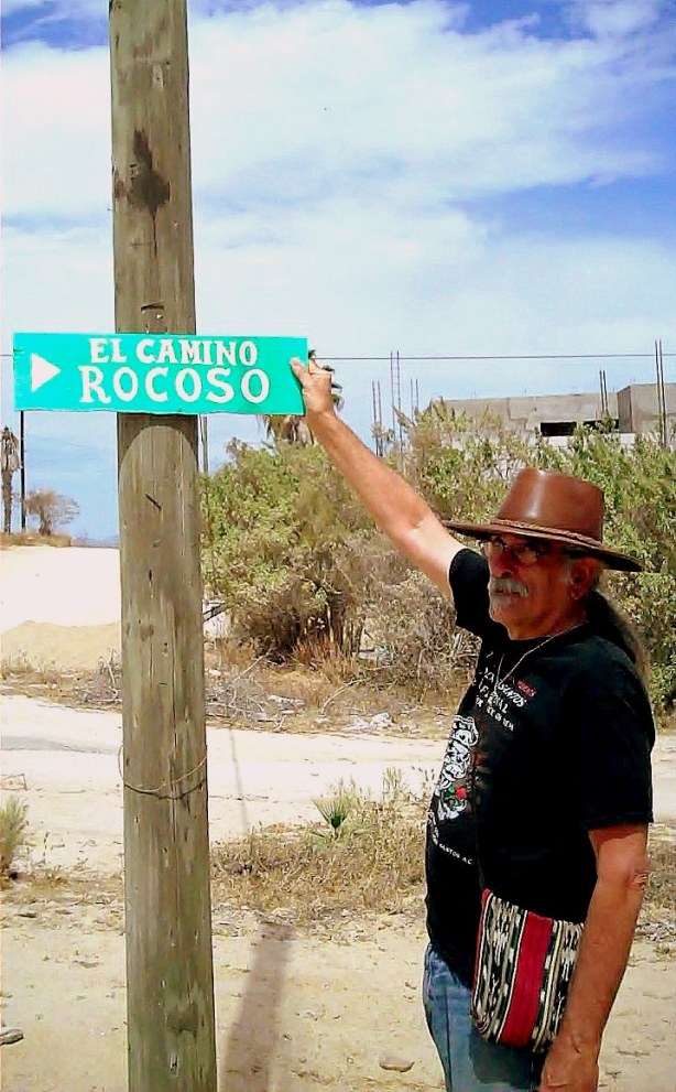 Area man proudly displays self-named street sign, actually it's not named after him, and the sign did not name itself, but you get the idea.
